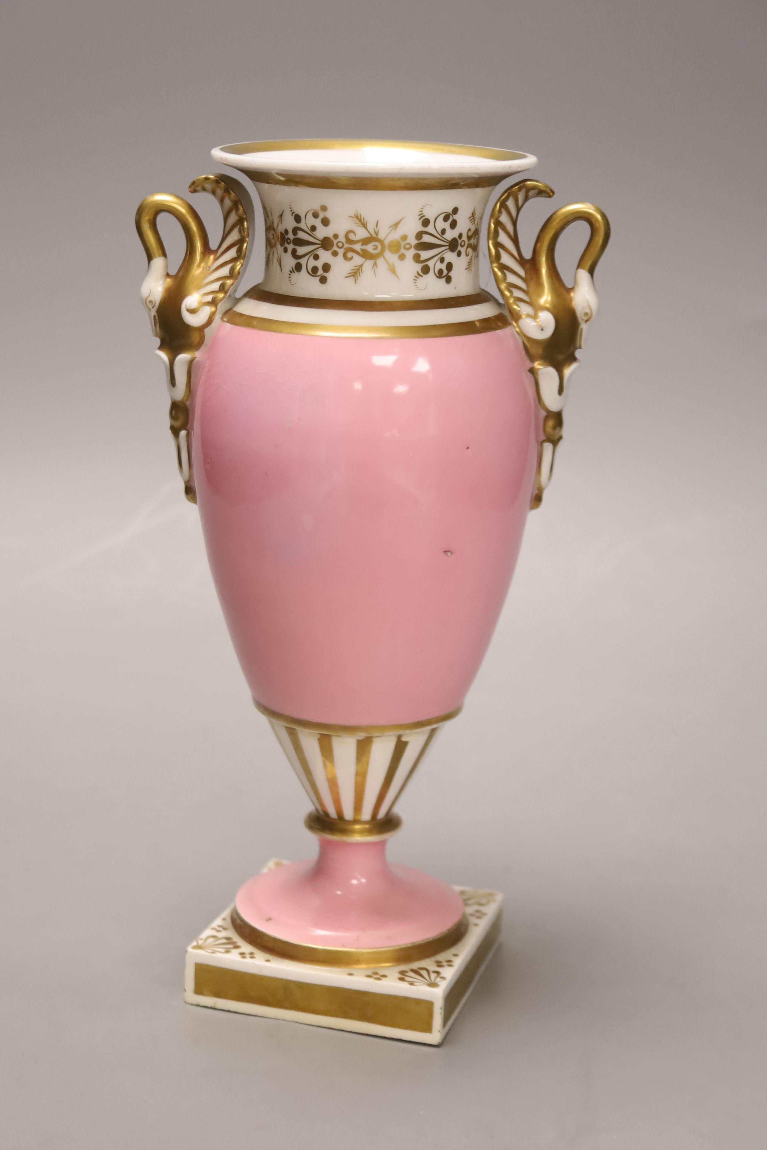 A Chamberlains Worcester pink ground vase, with swan neck handles, Chamberlains script mark to base, height 23cm